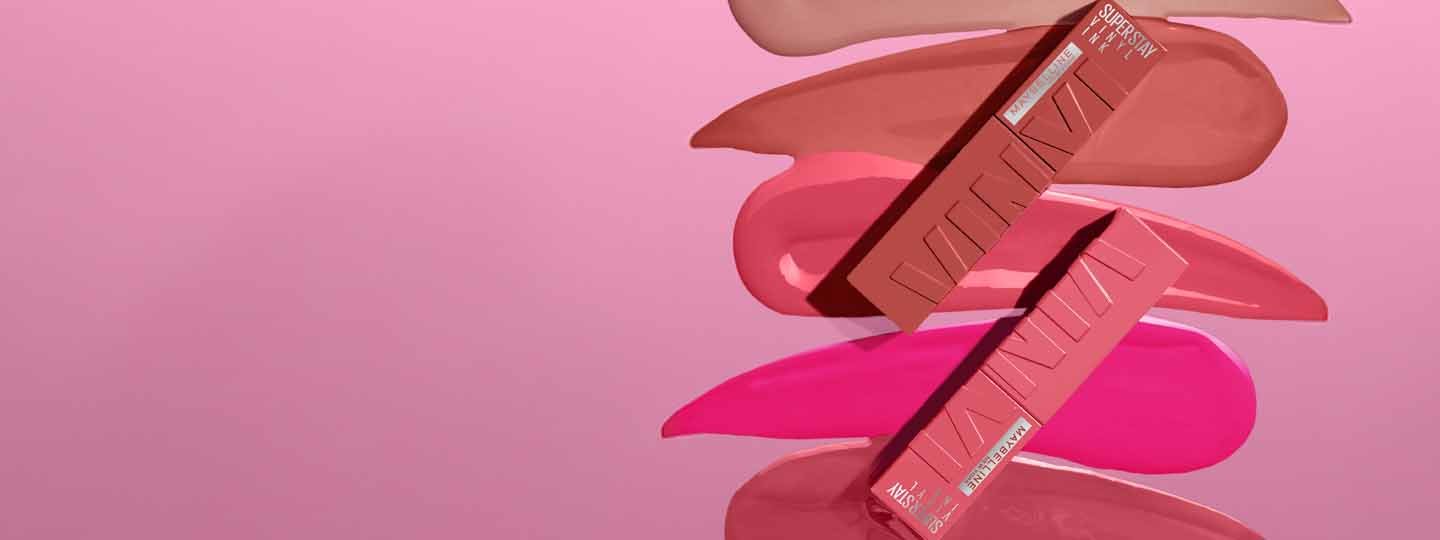 Woman applying Easy Eraser Maybelline product